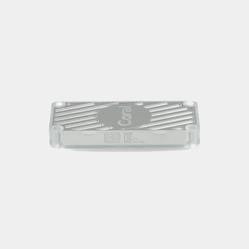 Accueil 24 Accélérateur Google Coral USB gris vu de dessus avec logo Coral